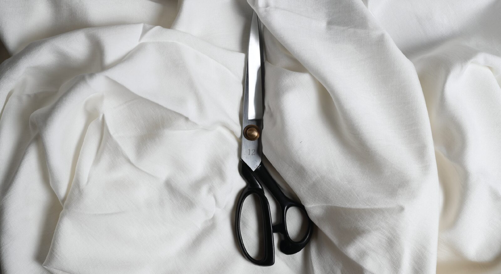 Dressmaker's shears on fabric